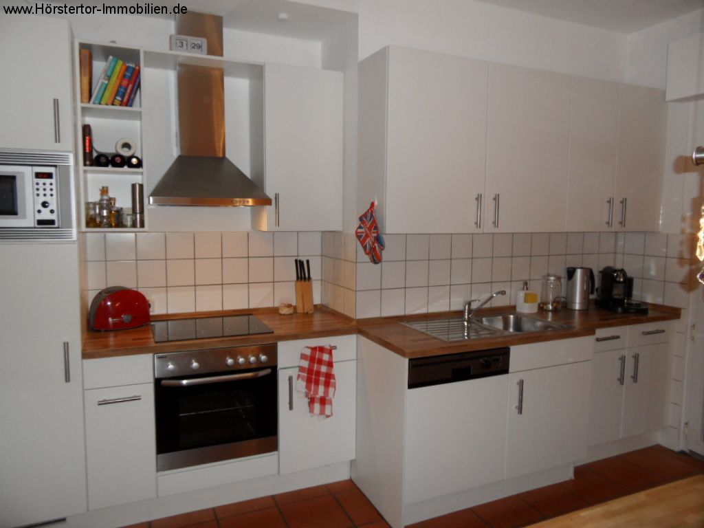 Schicke Altbauwohnung im Hochparterre mit Garten und Garage!