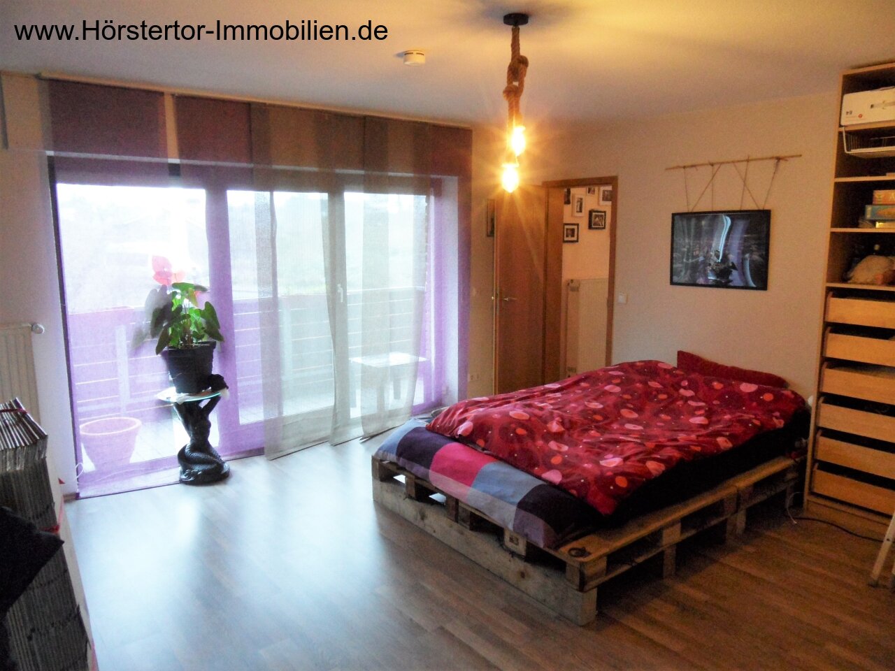 Schlafzimmer mit Balkon